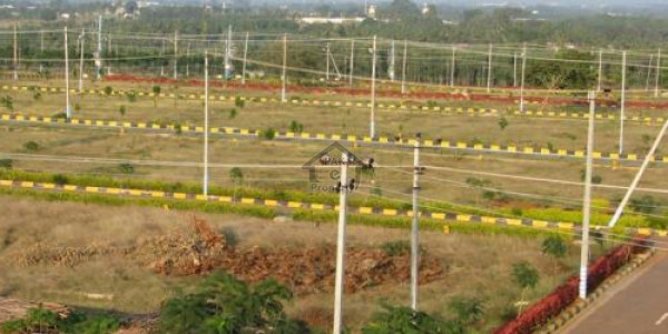 Faisal Town A block main double road 8 marla plot for sale