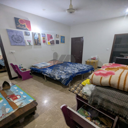 Ideal Investment: Building with 2 Shops & 3 Apartments – Saadi Town Block 3